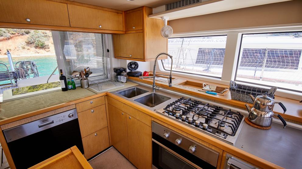 Functional kitchen with large windows on a catamaran