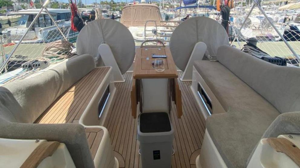 The luxurious cockpit of the sailing yacht offers comfortable transport for guests.