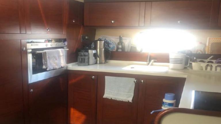 Kitchen with all the necessary things on the yacht