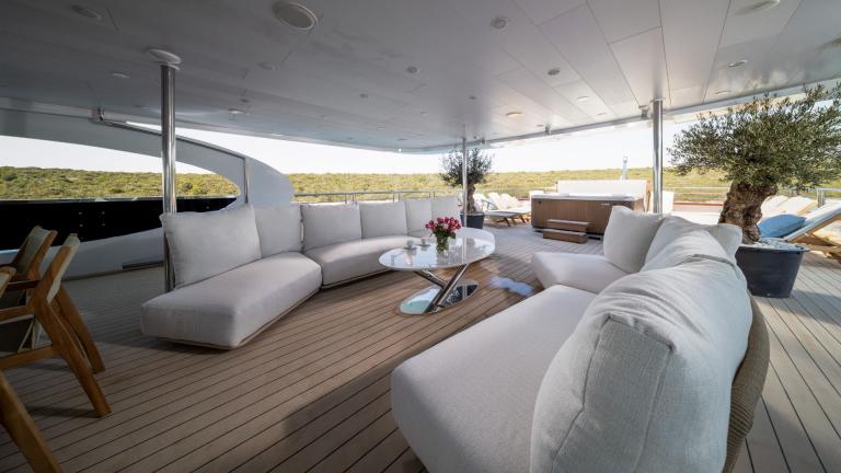 Upper deck seating area of luxury motor yacht Olimp image 2